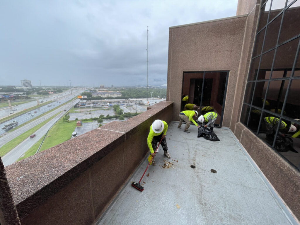 Resurfaced concrete balcony with high-solids silicone coating and ceramic granules on Arlington high-rise by Pepper Coatings