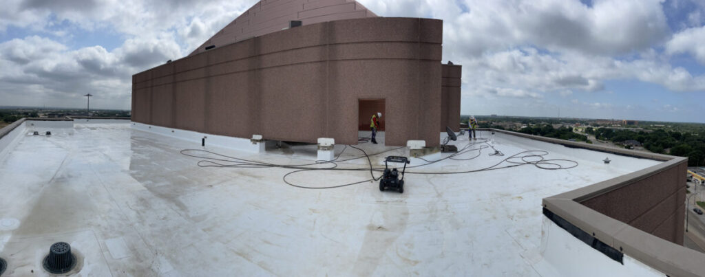 Resurfaced concrete balcony with high-solids silicone coating and ceramic granules on Arlington high-rise by Pepper Coatings