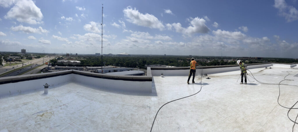 Resurfaced concrete balcony with high-solids silicone coating and ceramic granules on Arlington high-rise by Pepper Coatings