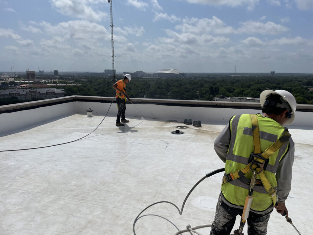 Resurfaced concrete balcony with high-solids silicone coating and ceramic granules on Arlington high-rise by Pepper Coatings