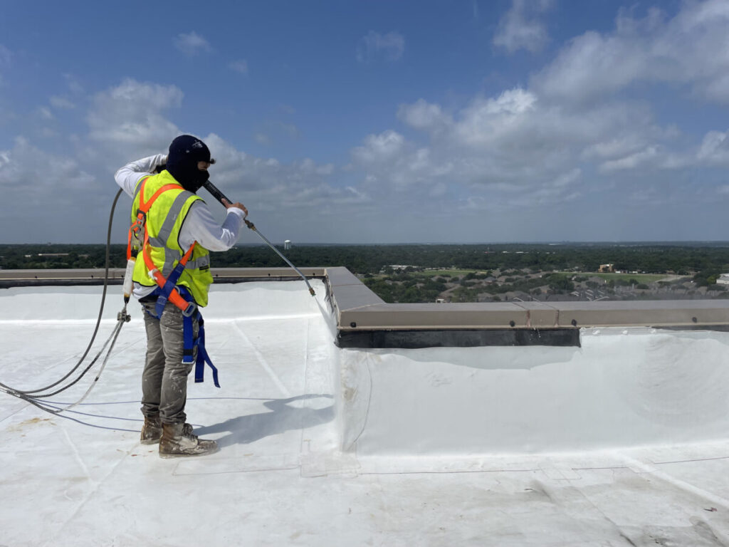 Resurfaced concrete balcony with high-solids silicone coating and ceramic granules on Arlington high-rise by Pepper Coatings