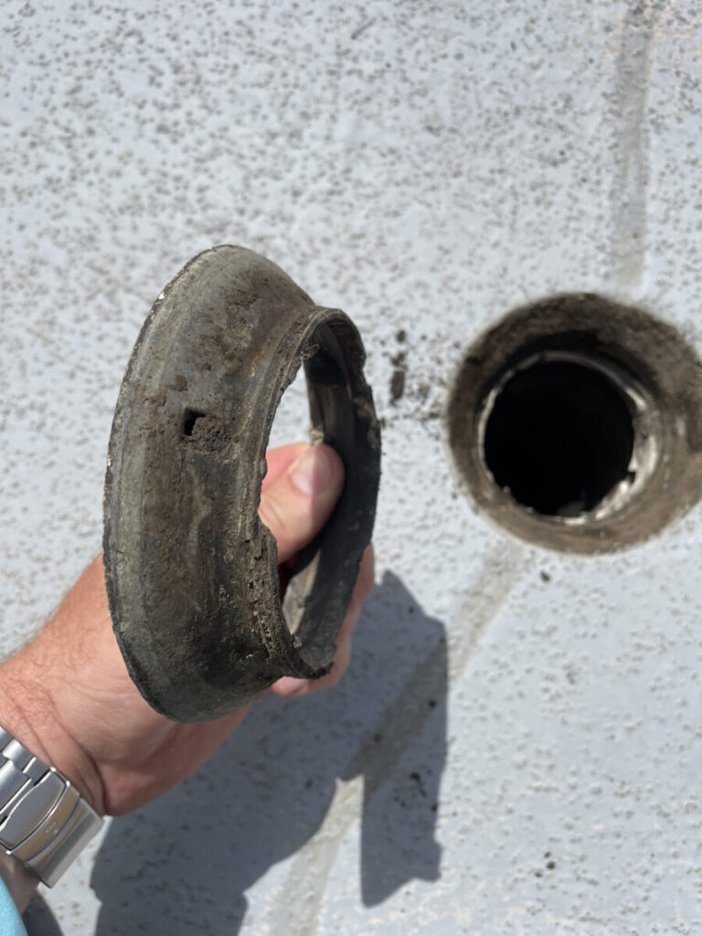 Resurfaced concrete balcony with high-solids silicone coating and ceramic granules on Arlington high-rise by Pepper Coatings