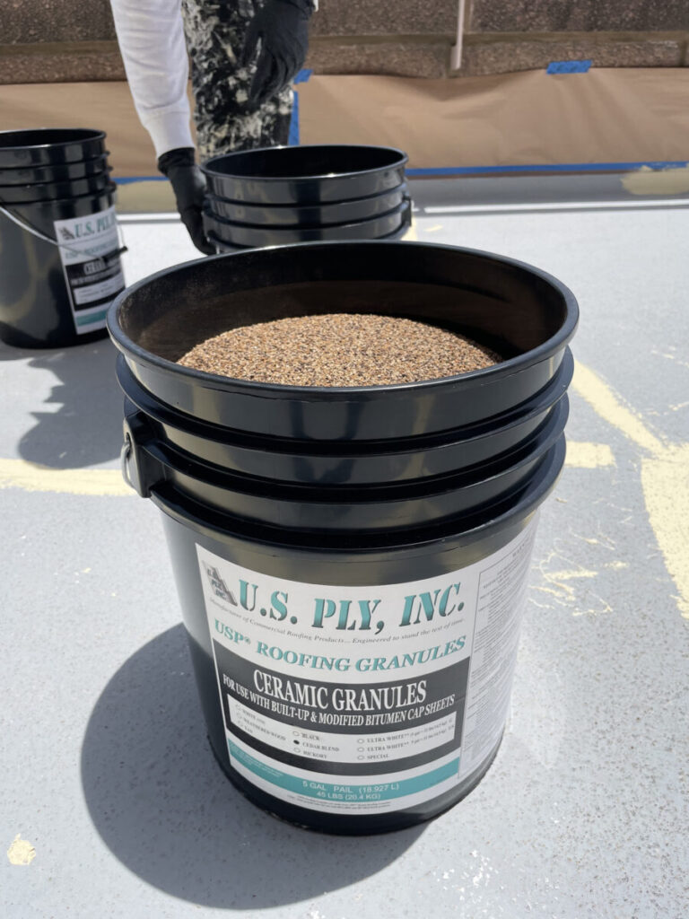 Resurfaced concrete balcony with high-solids silicone coating and ceramic granules on Arlington high-rise by Pepper Coatings