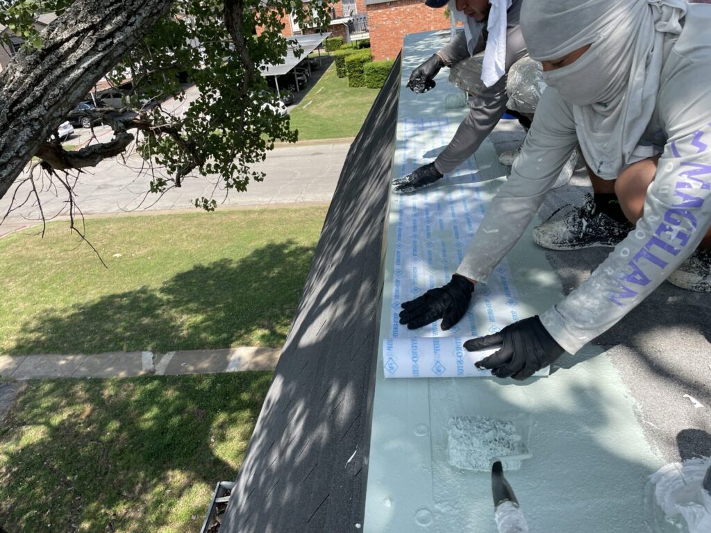 White silicone roof coating over Modified Bitumen at a 60,000 sq ft multifamily complex in Central Arlington, TX