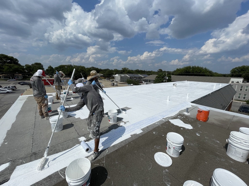 Prepped penetrations and 3-coursed perimeter edge on the multifamily flat roof in Arlington, TX