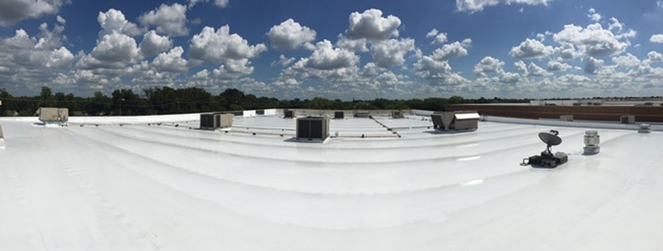 Completed high-solids silicone roof coating at Cedar Hill Crossing retail strip center, Cedar Hill, TX