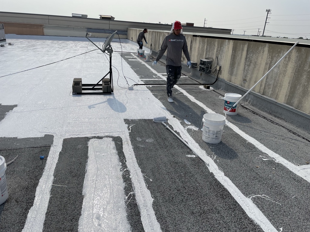 Completed elastomeric roof coating system on a large commercial roof