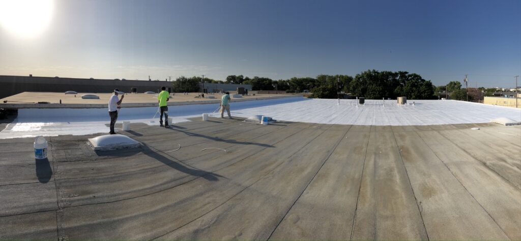 Existing Modified Bitumen commercial roof before silicone coating at 2625 Freewood Dr, Dallas, TX