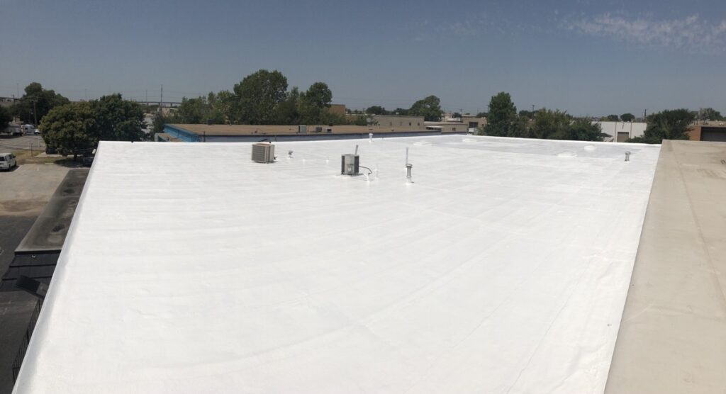 Mastic installed at the perimeter drip edge and penetrations on the 10,500 sq ft roof, Dallas