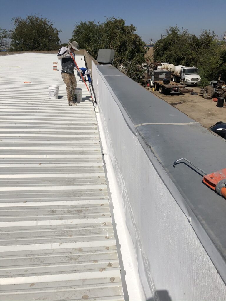 3-coursed horizontal seams with silicone and nylon fabric on the metal R-panel roofing system in Dallas, TX
