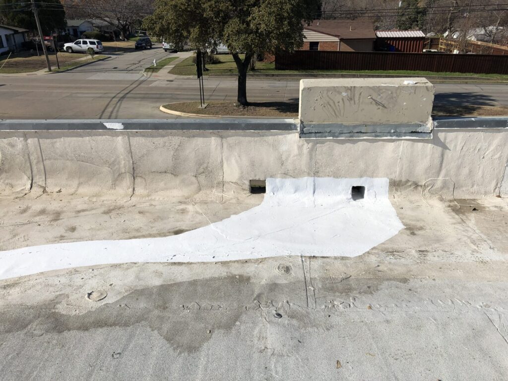 Failed acrylic sections removed ahead of the silicone roof coating repair in Dallas, Texas