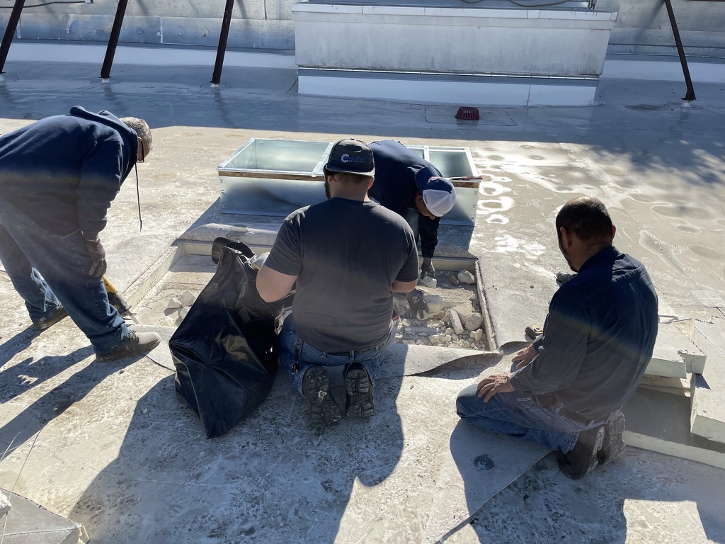 Existing TPO membrane marked for the mechanical RTU curb cut-in at the YETI tenant space, Dallas, TX