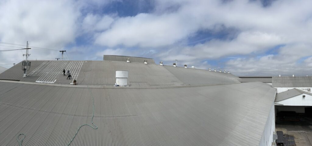 75-foot-high corrugated metal roof at Sylvania Industrial Park in Fort Worth, TX during restoration by Pepper Coatings