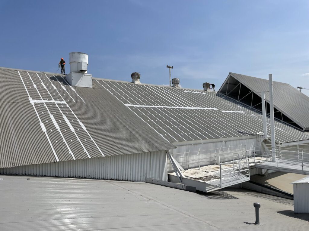 3-coursed ridge seams on the corrugated metal roofing system at the 64-acre Sylvania Industrial Park campus