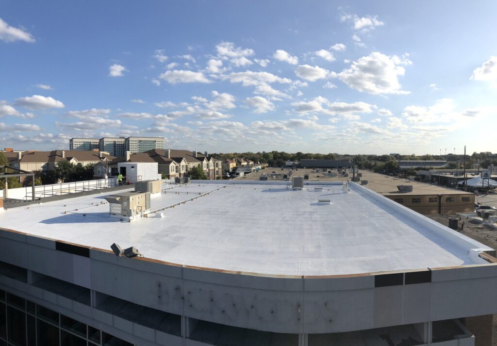 Completed watertight white silicone roof at 2727 West Seventh St., Fort Worth