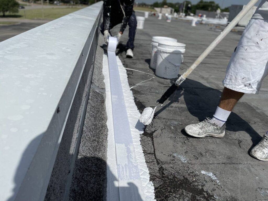 Detail work and coating application at the Staples tenant section of Greenville Promenade, TX