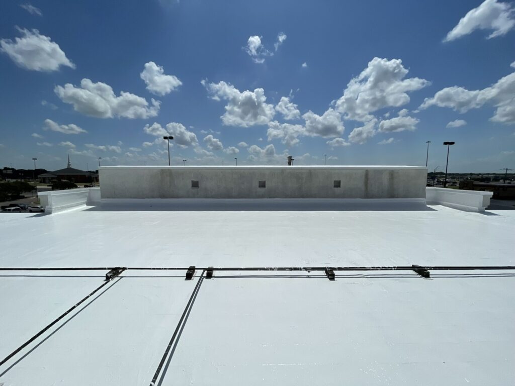 Finished 30,000 sq ft silicone roof coating over the commercial flat roof at Greenville Promenade