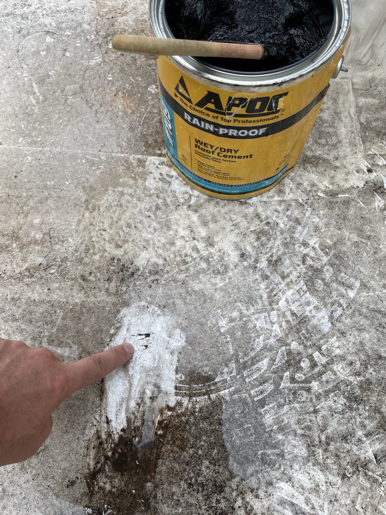 Silicone roof coating maintenance on commercial flat roof at Melbourne Plaza Retail Complex, Hurst