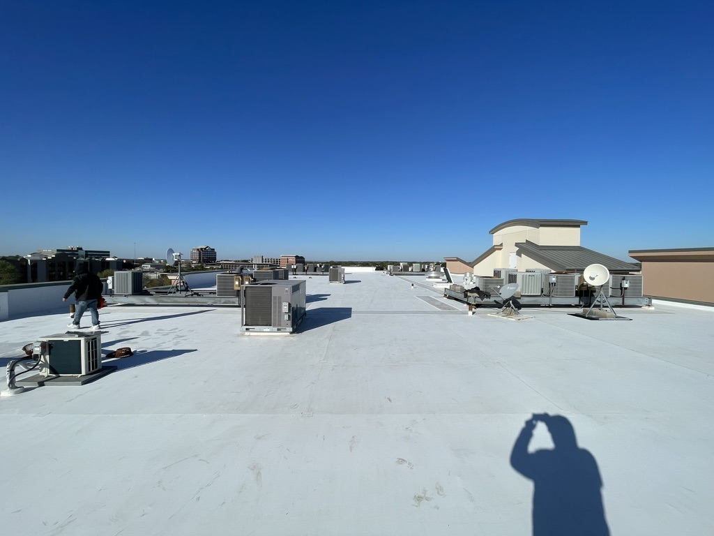 Completed silicone roof coating over TPO roofing system at Saint Camillus Medical Center, Hurst, TX