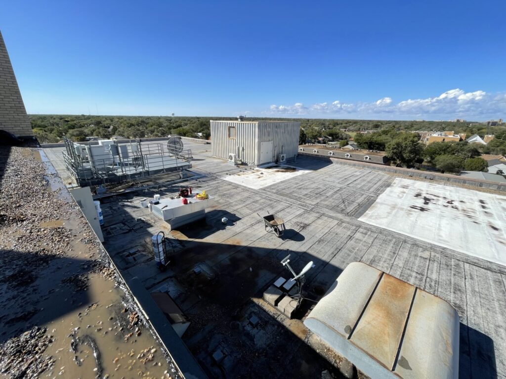 50,000 sq ft Modified Bitumen and built-up roof before silicone coating at 2010 Avenue R, Lubbock, TX