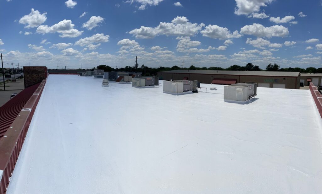 Finished 13,000 sq ft silicone roof coating system near AutoNation, North Richland Hills, Texas