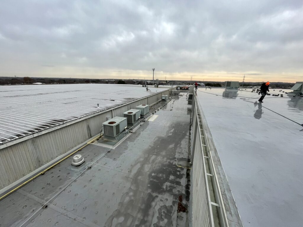 45,000 sq ft flat commercial TPO roof ready for silicone coating at 6625 Iron Horse Blvd, NRH