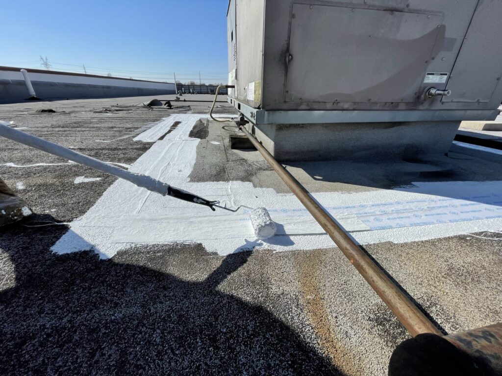 Failing EPDM expansion joint dividing the two commercial tenant spaces in Plano, Texas