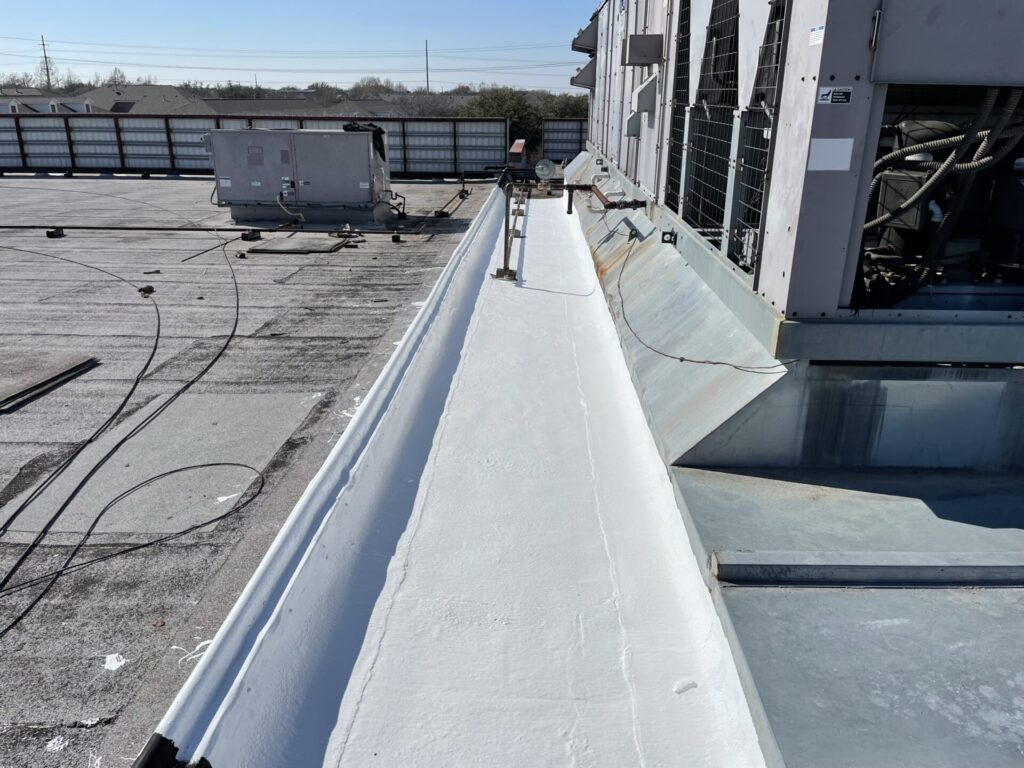 Completed silicone roof coating repairs over the leak areas at 6265 Coit Rd, Plano, Texas