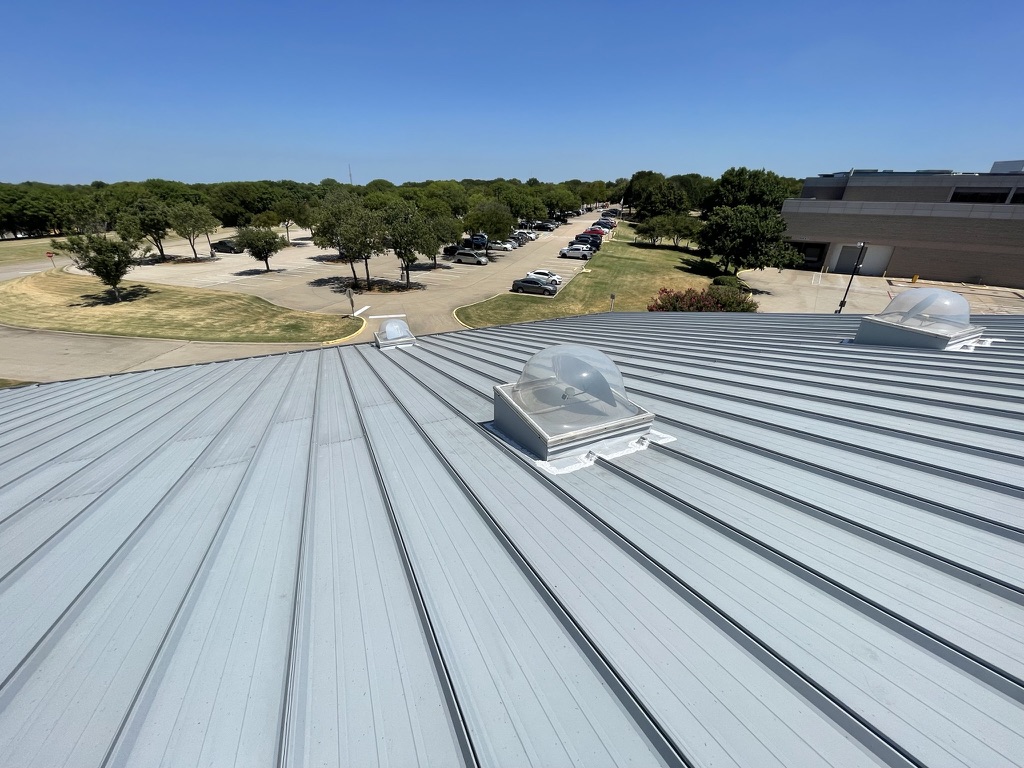 Completed skylight leak repair on the standing seam roof at 7701 Legacy Dr, Plano, TX