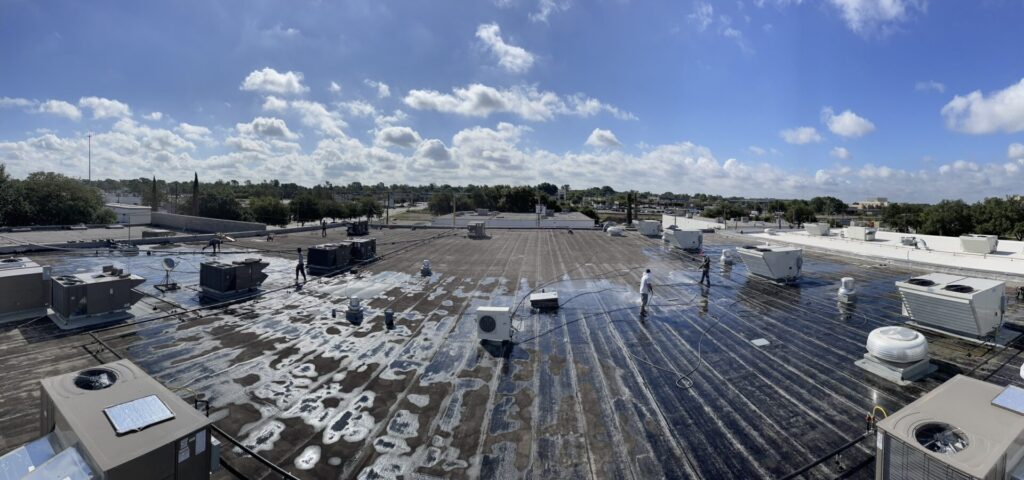 32,000 sq ft Modified Bitumen flat roof at Clay Cooley Volkswagen of Richardson before silicone roof coating