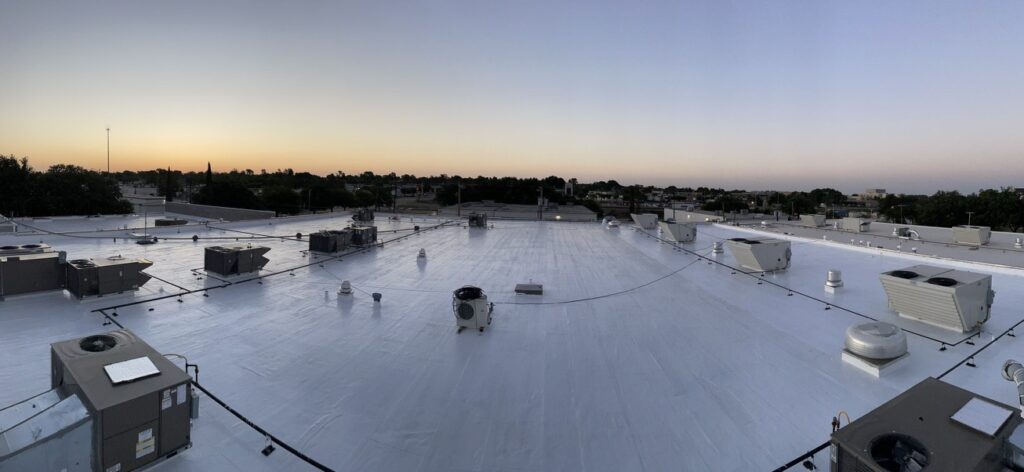 Completed 32,000 sq ft silicone roof coating at the intersection of HWY-75 and W Jackson St, Richardson, TX