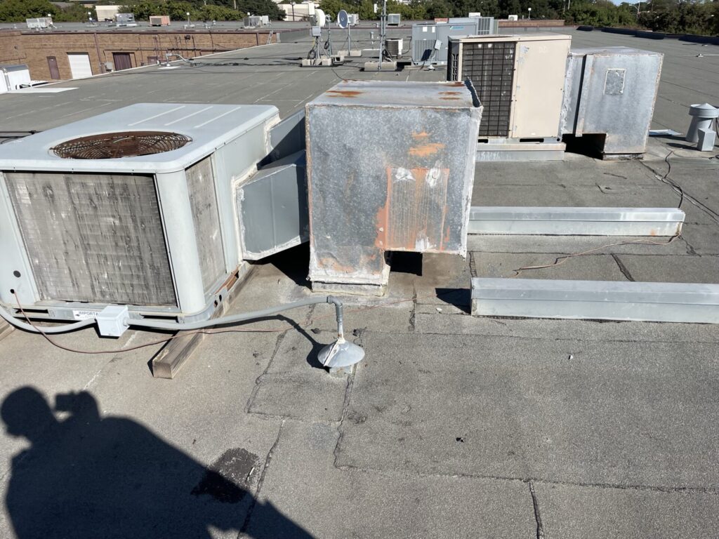 Commercial Modified Bitumen roof at Central Park Business Center before silicone seam sealing, 1910 Firman Dr, Richardson, TX