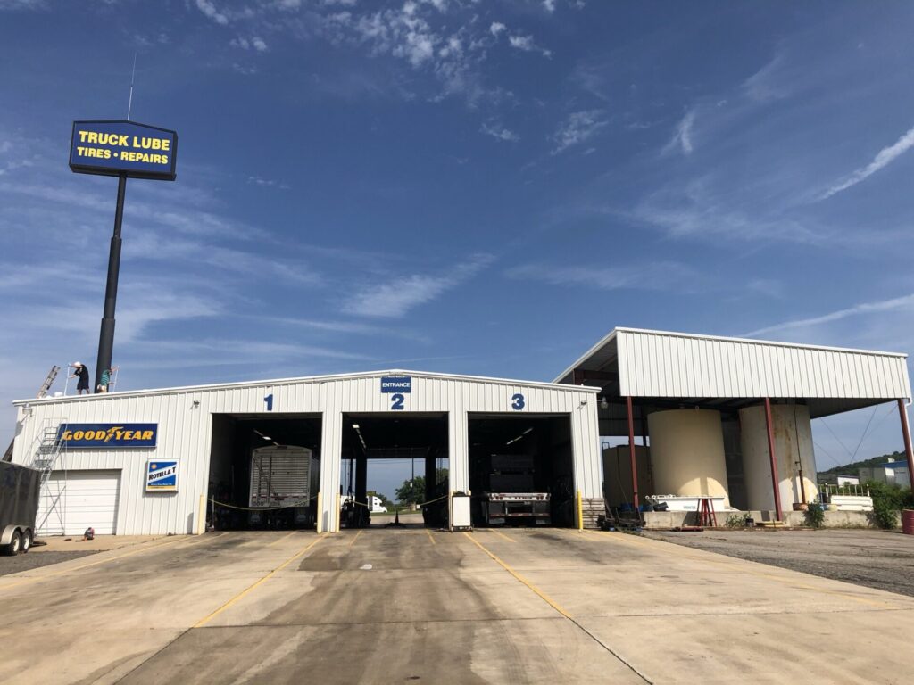 Existing metal R-panel roof at the Goodyear Tire facility before silicone coating, 185 Interstate Ave, Russellville, Arkansas