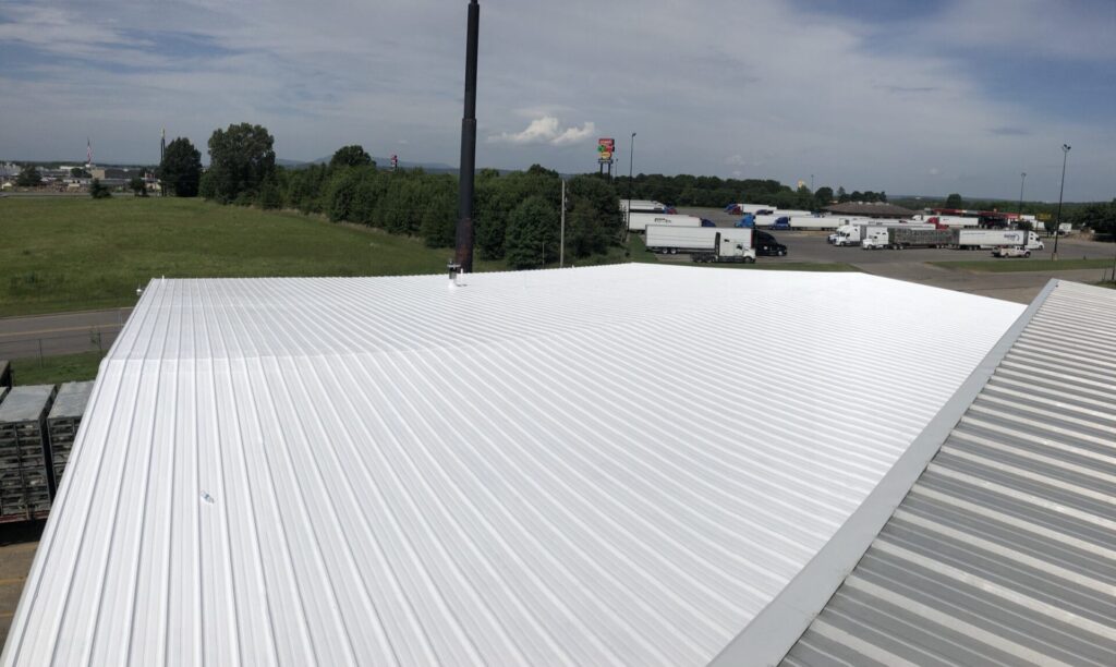 Completed white silicone roof coating on the Goodyear Tire metal roof in Pope County, Russellville, Arkansas
