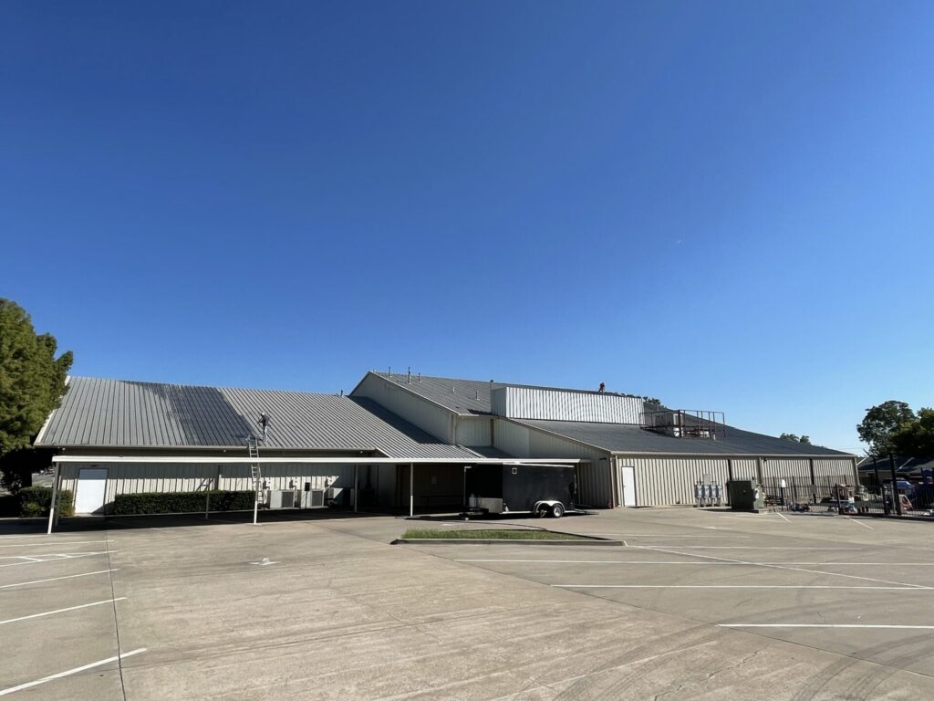 35,000 sq ft R-panel metal roof at Church of Christ before acrylic roof coating, Sanger, TX