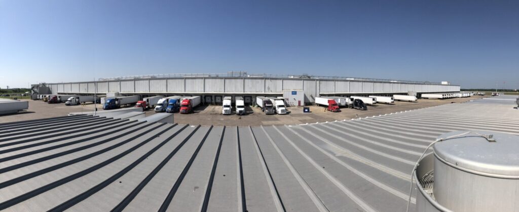 Completed industrial roof repair with silicone mastic at 591 Apache Trail near I-20 and FM 148, Terrell, TX
