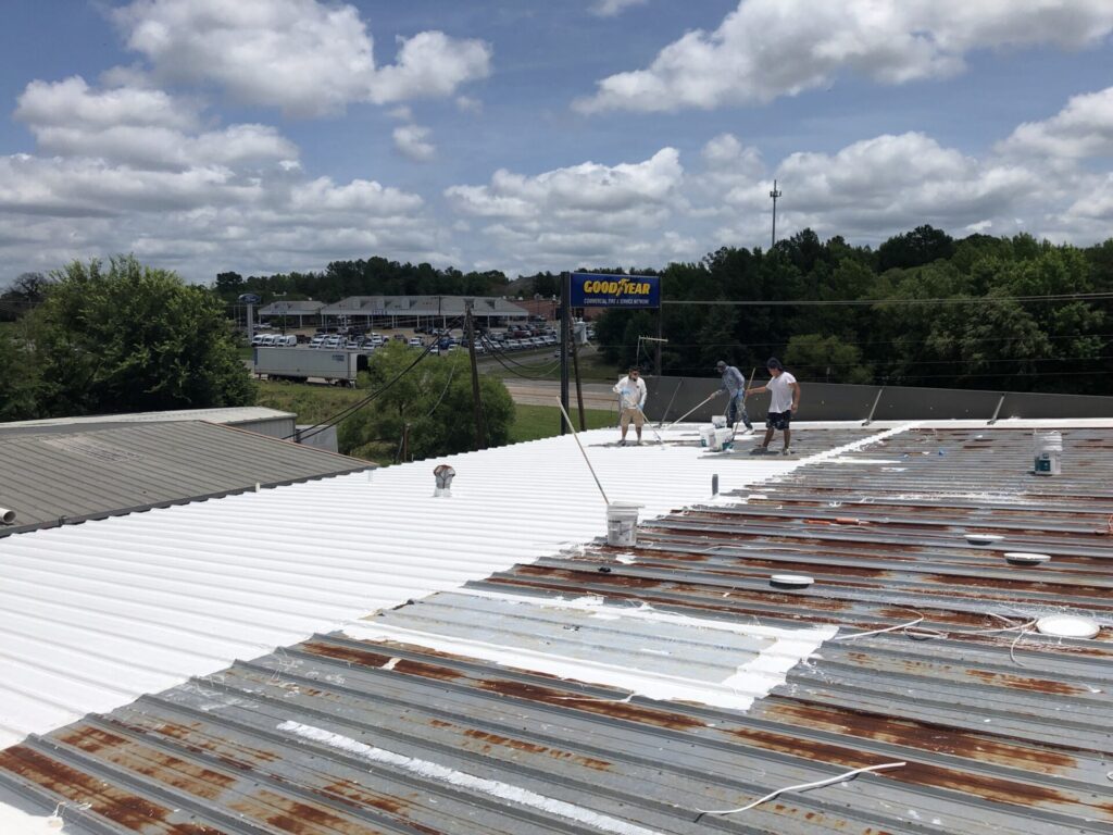 Silicone mastic applied to skylight seams and penetrations on the R-panel roof, Tyler, TX