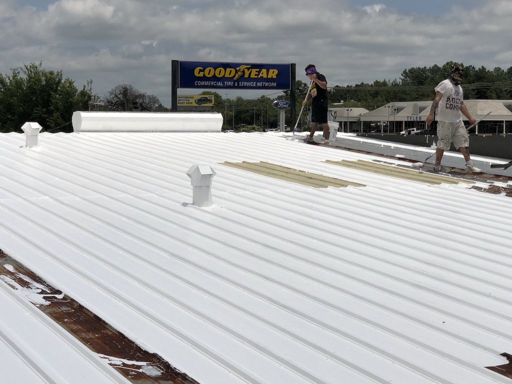 Finished energy-efficient silicone roof coating system at GoodYear Tire on S SW Loop 323, Tyler, TX