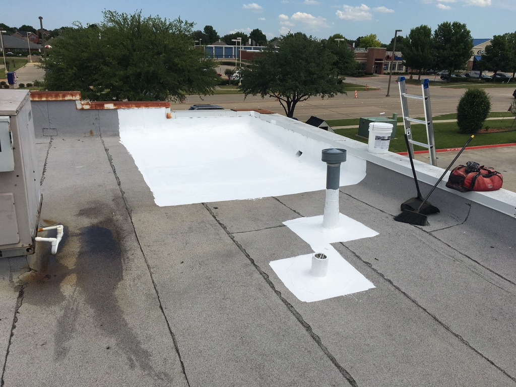 Pipe jack sealed with silicone mastic on the commercial flat roof, Allen, TX