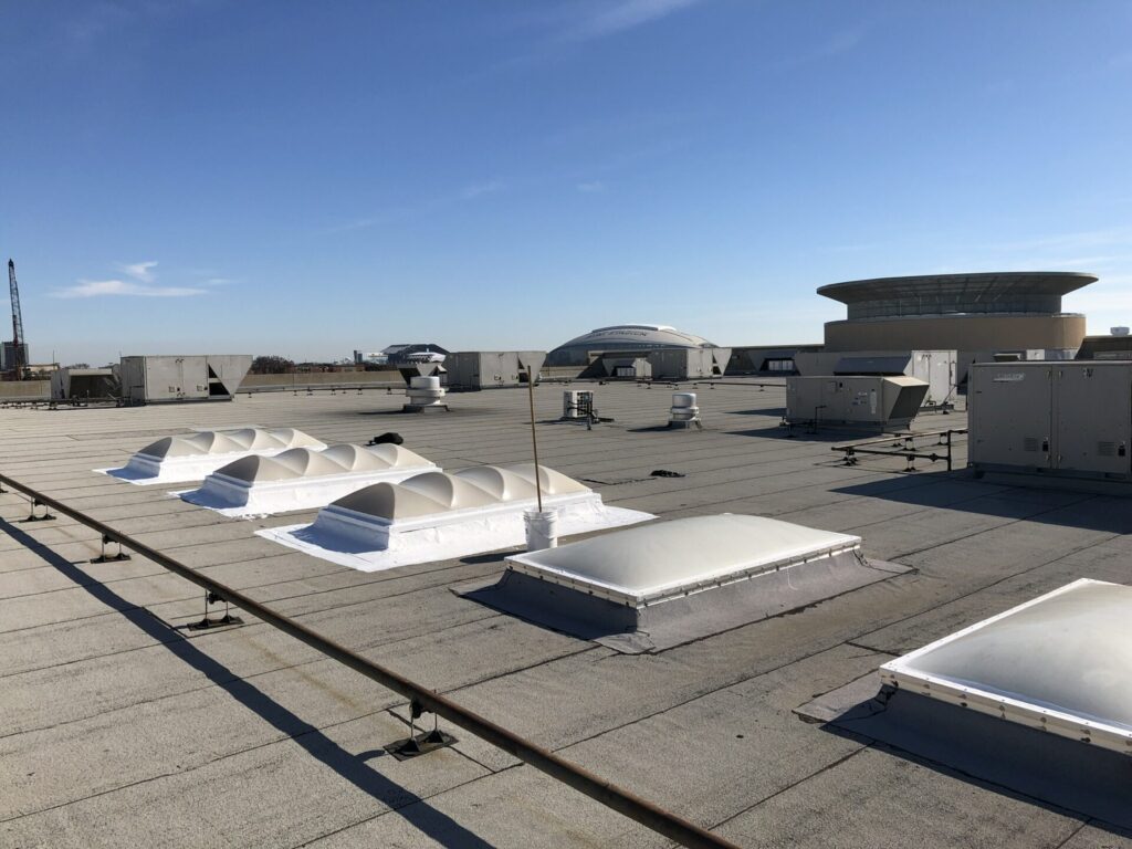 Skylight curb inspected for water intrusion during heavy rain events, Arlington, Texas