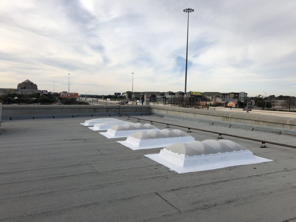 Skylight frame sealed to the dome with silicone to stop water intrusion, Arlington, TX