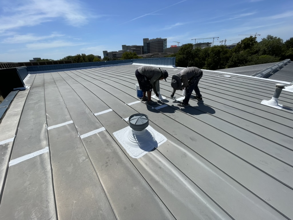 Horizontal seams in the sheet metal roofing system that had opened up, Inwood Rd and Maple Ave, Dallas