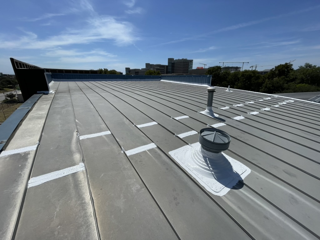 GAF silicone mastic applied over 100 feet of old EPDM flashing, Dallas, Texas