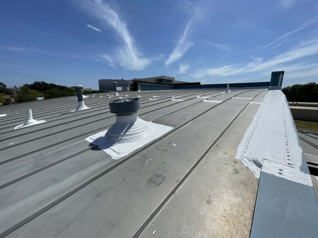 Completed silicone mastic repairs to flashing, seams and penetrations at 2419 Inwood Rd, Dallas