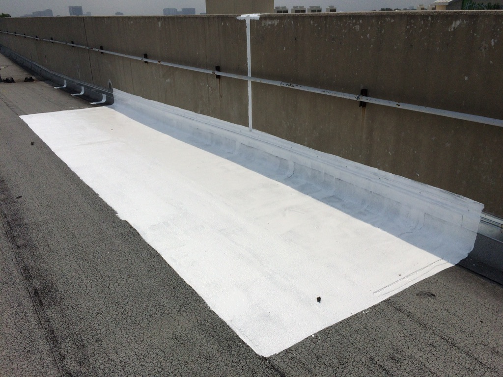 Silicone mastic applied at the termination bar and concrete expansion joint, Dallas, Texas