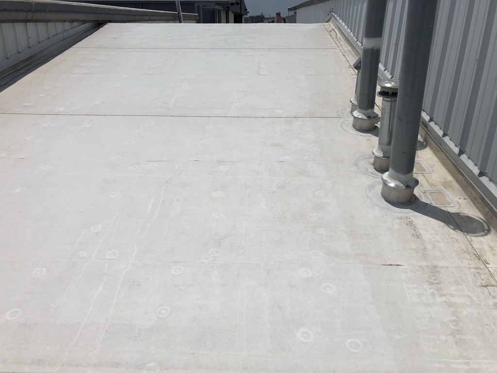 Small puncture located in the TPO membrane during commercial roof leak detection, Fort Worth, Texas