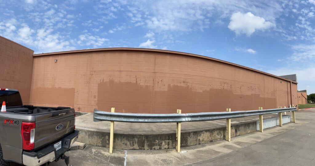 Failed vertical wall coating and cracking CMU block joints at the rear wall, Grapevine, TX