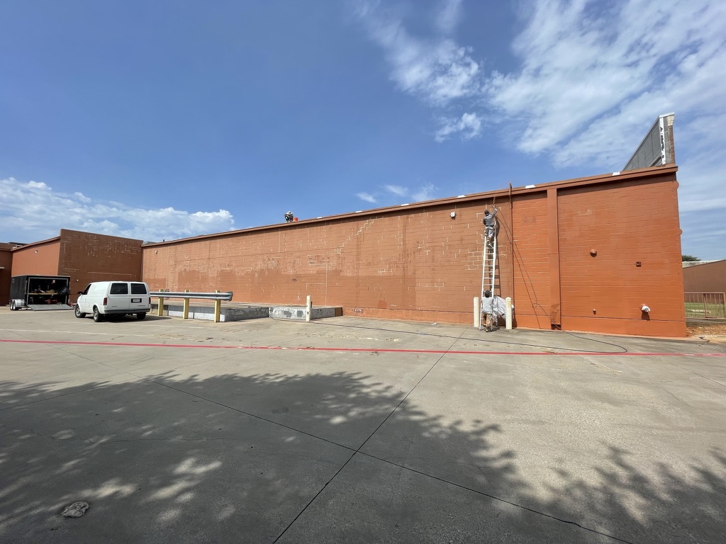 NP1 urethane caulking applied to failing expansion joints in the CMU block wall, Grapevine, TX