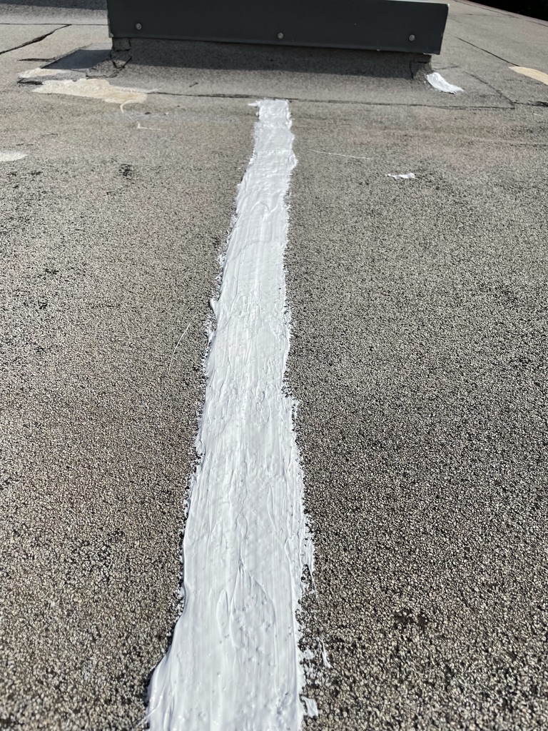 GAF silicone mastic applied to a separated Modified Bitumen seam in Grapevine, Texas