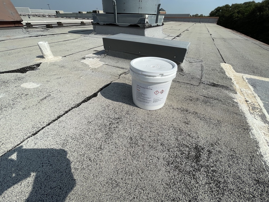 Completed silicone mastic repairs across 13 leak locations at Hobby Lobby, Grapevine, TX